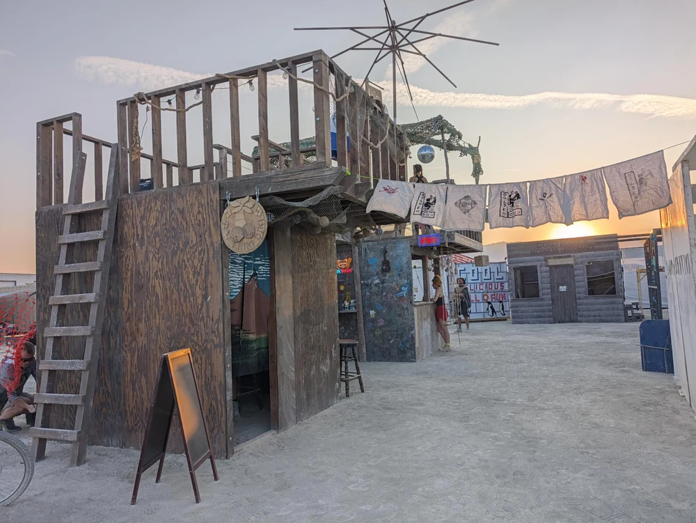 The two-story bar Allie built, at sunset on the playa